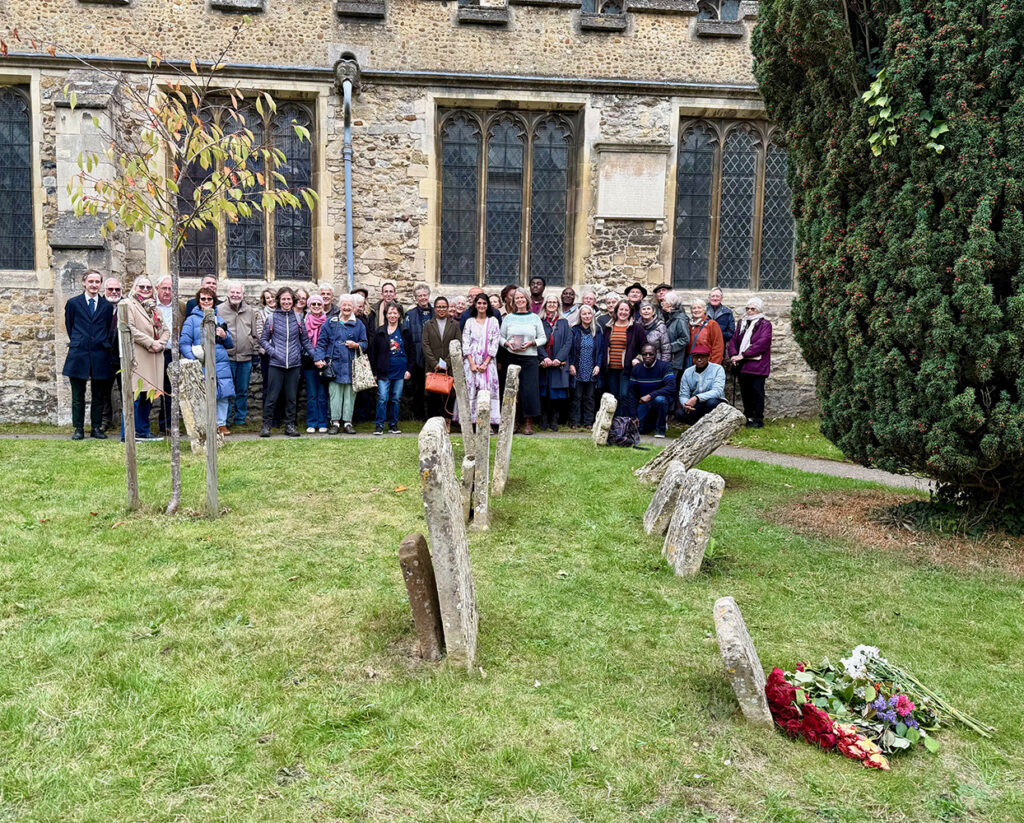 A group of people gathered in St Andrew’s Church, Chesterton, for the commemoration event. Bunches of flowers lay in front of Anna Maria Vassa's gravestone.