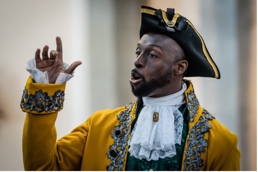 A close up of actor performing as Equiano.