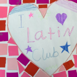 A child-made paper mosaic which reads ‘I love Latin club’.