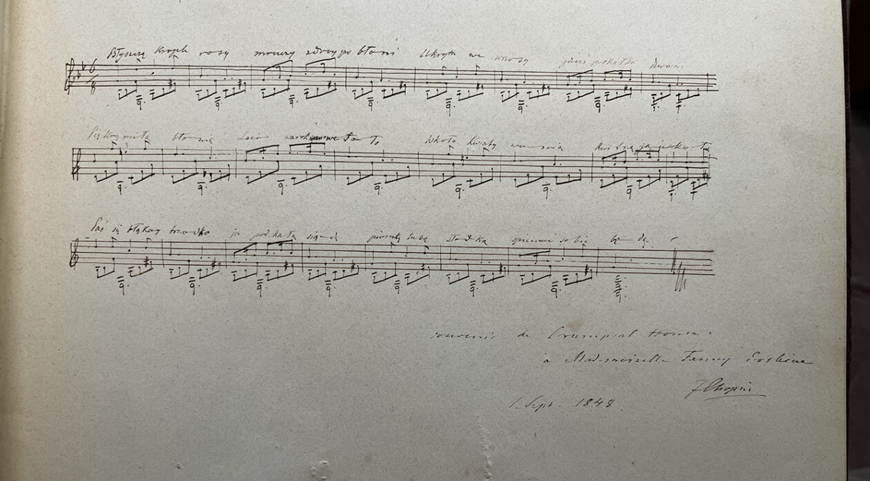 A sheet of music with handwritten notes.
