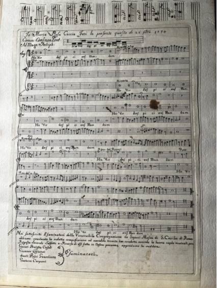 A sheet of music with hand written notes.