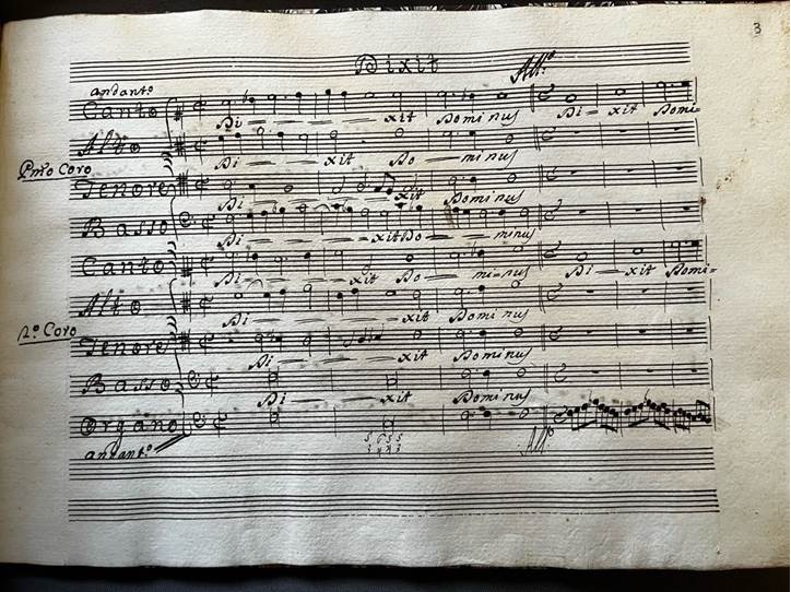 A sheet of music with hand written notes.