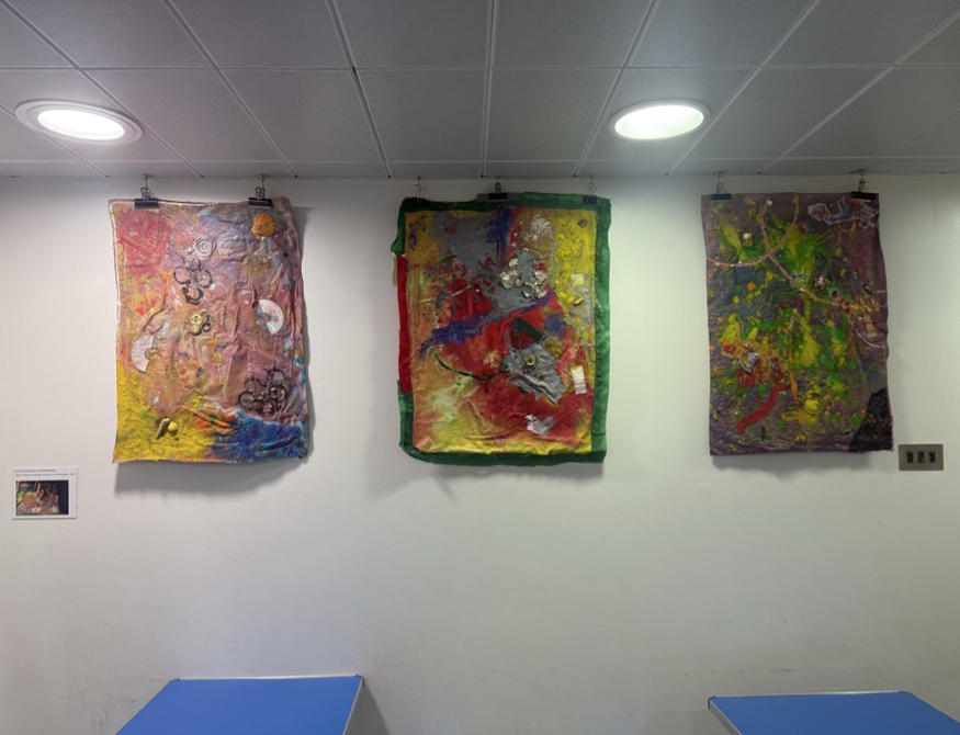 The final artworks inspired by the work of abstract artist Frank Bowling hanging in the Fitzwilliam Museum schools’ lunchroom.
