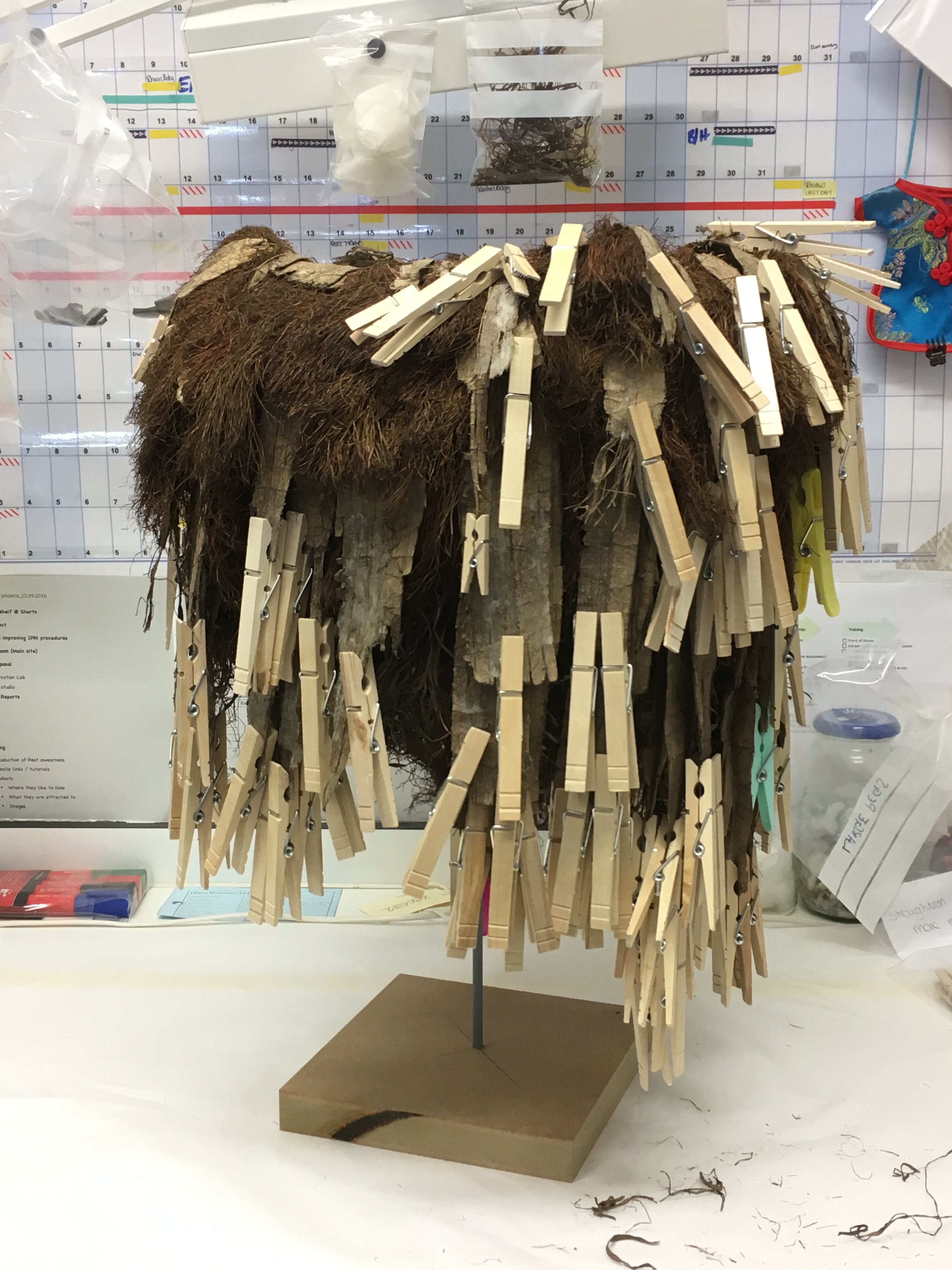 A fibre skirt from Papua New Guinea covered in wooden pegs