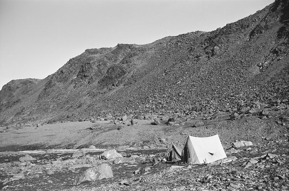 A tent in a rocky landscape