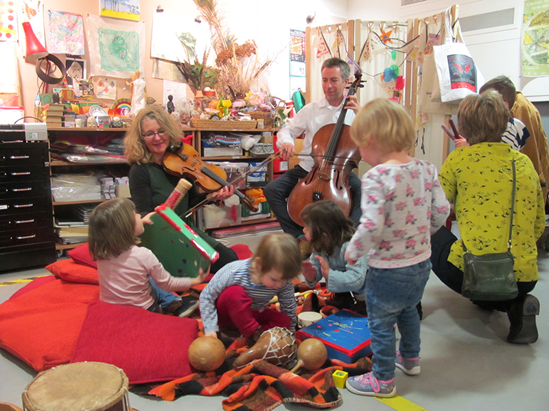 playing music with children in the studio