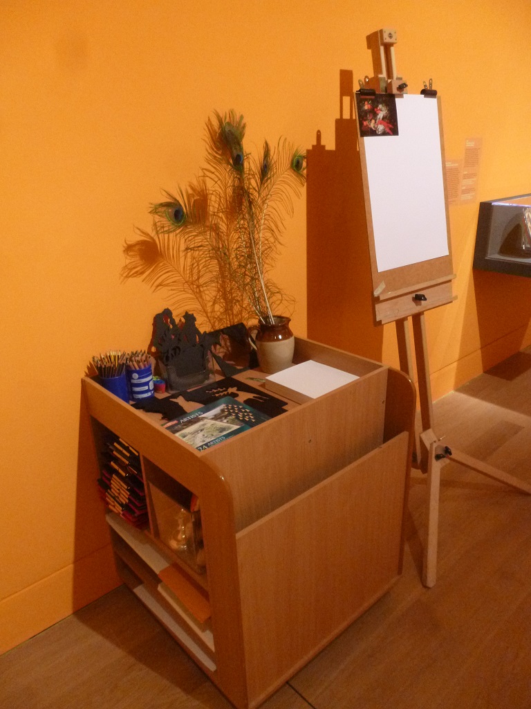 The art trolley with paper and art-making equipment for visitors to use in the Creative Zone