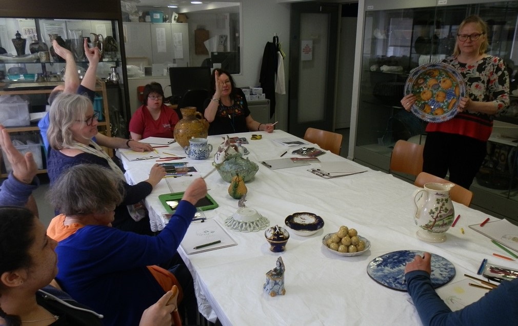 Voting on the best way to display the pomegranate charger in Feast & Fast: a unanimous vote in favour of it being hung vertically as I am demonstrating