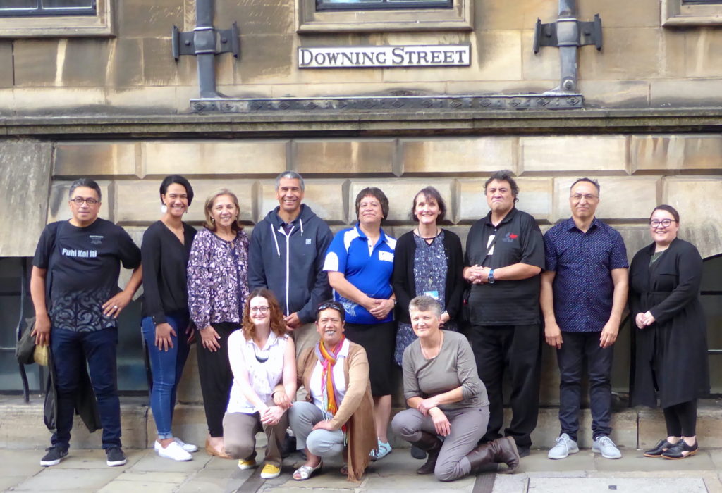 A Māori delegation photographed outside of the Museum