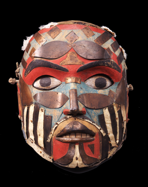 Painted, wooden mask with strips of copper and leather
