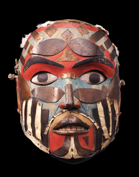 Painted, wooden mask with strips of copper and leather 