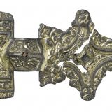 Z 7106 A. Square headed brooch set with garnets and decorated with "chip carved" zoomorphic ornament in Salin’s style I.