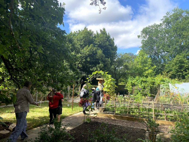 Young people walking through the Botanic Garden while on a sound walk