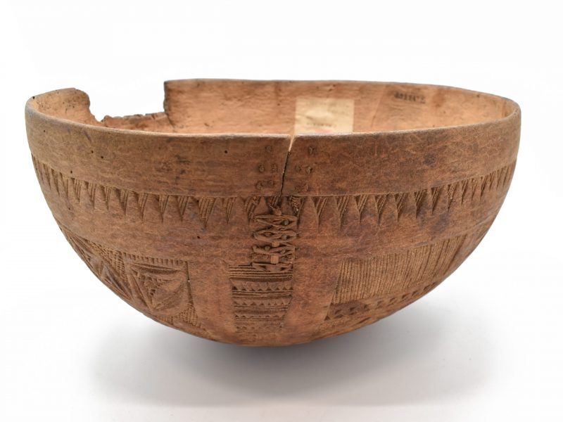 Gourd bowl showing detail of repair stitching on the outside