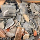 A box full of unsorted Roman and Post Medieval pottery, prior to processing by Stores Move team