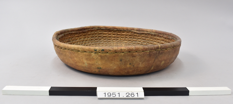 Coiled woven basket