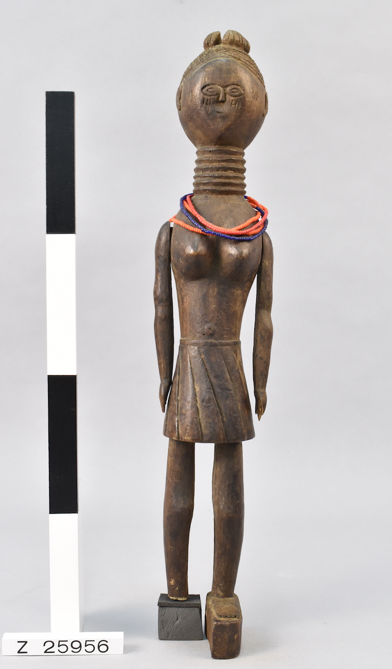 Wooden figurine of a woman