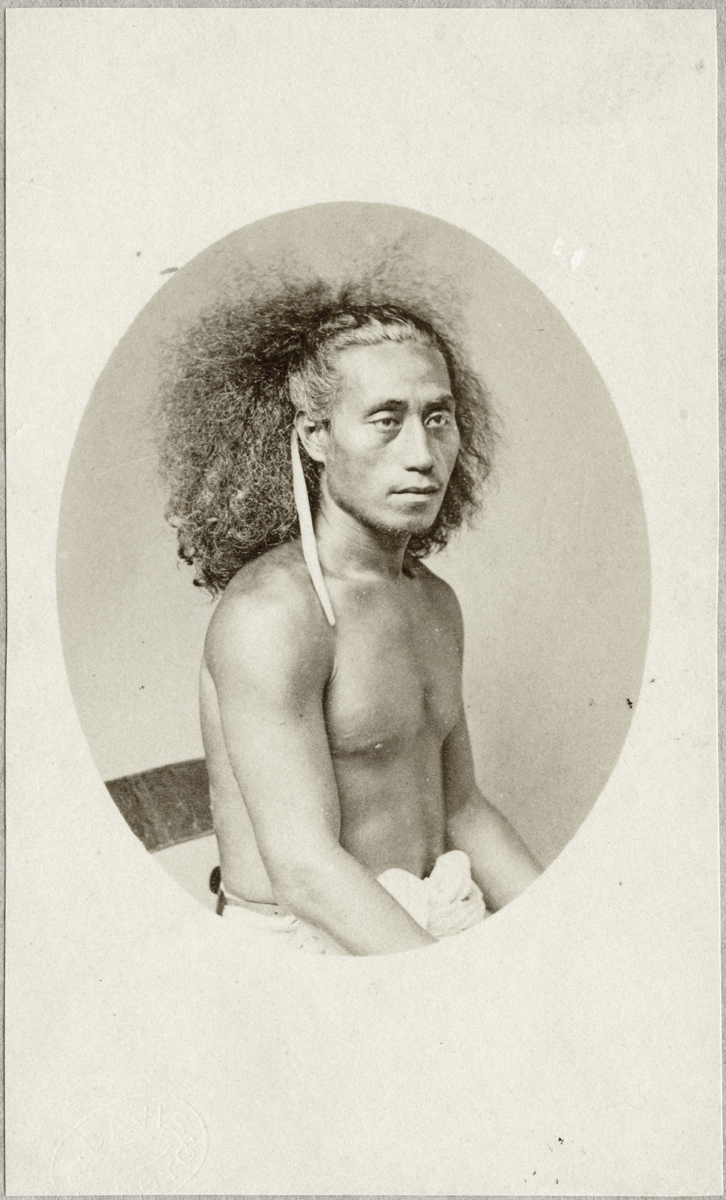 Black and white portrait photo of a Samoan person with untied hair