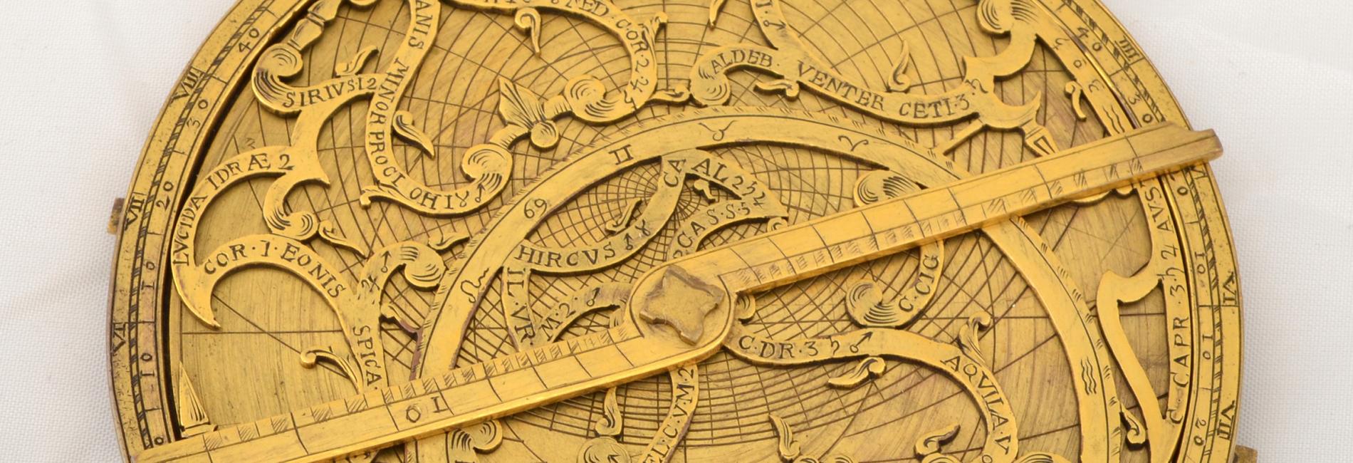Astrolabe, gilt copper, purportedly by Johannes Bos of Rome, dated 1597, but now identified as a modern fake, c.1920, 100mm diameter, Whipple Museum of the History of Science