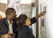 Visitors looking at art