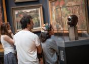 Visitors looking at art