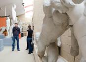 people exploring the casts inside the museum