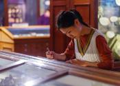 A person drawing in the Sedgwick Museum