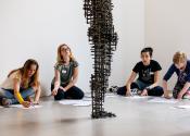 Students drawing an Antony Gormley at Kettle's Yard