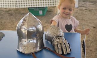Child trying on armour