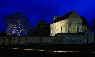 The Farmland Museum and Denny Abbey in twilight