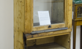 Wooden fume cupboard with glass panel