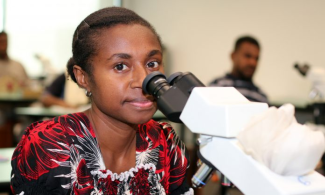 Picture of woman with microscope 