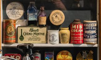 Museums shelves displaying household packaging from the 40s and 50s