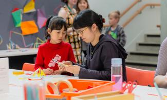 woman and child taking part in an art activity