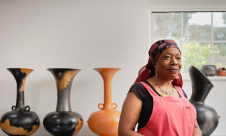 Magdalene Odundo in her studio