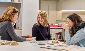 Three teachers enjoying a cup of tea