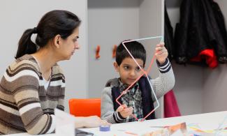 Child and parent creating at Studio Sunday