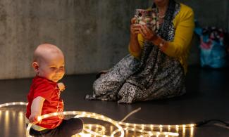 Baby playing with lights