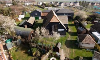 Aerial view of Burwell Museum sowing series of timber out buildings