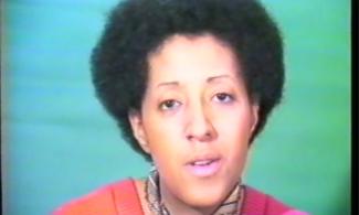 Still from a film, the artist is pictured