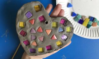 Clay heart decorated with mosaic tiles