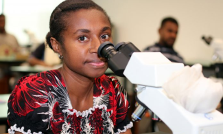 Picture of woman with microscope 