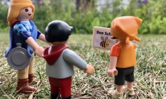 Image of toys going on a garden adventure