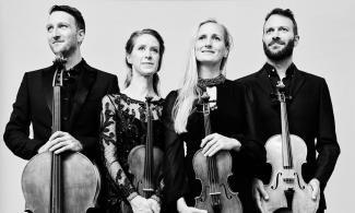 4 musicians holding their violins