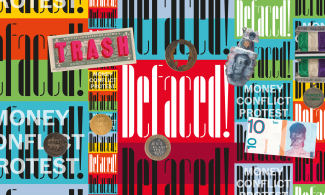defaced exhibition banner