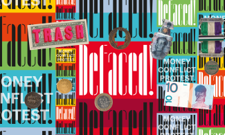 defaced exhibition banner