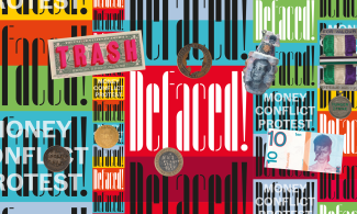 defaced exhibition banner