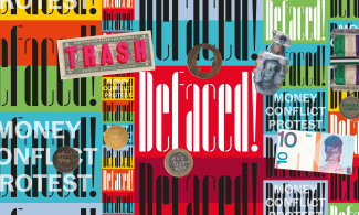 defaced exhibition banner