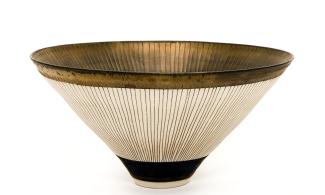 Gold coloured bowl with a creamy centre