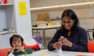 mother and child take part in creative activities 